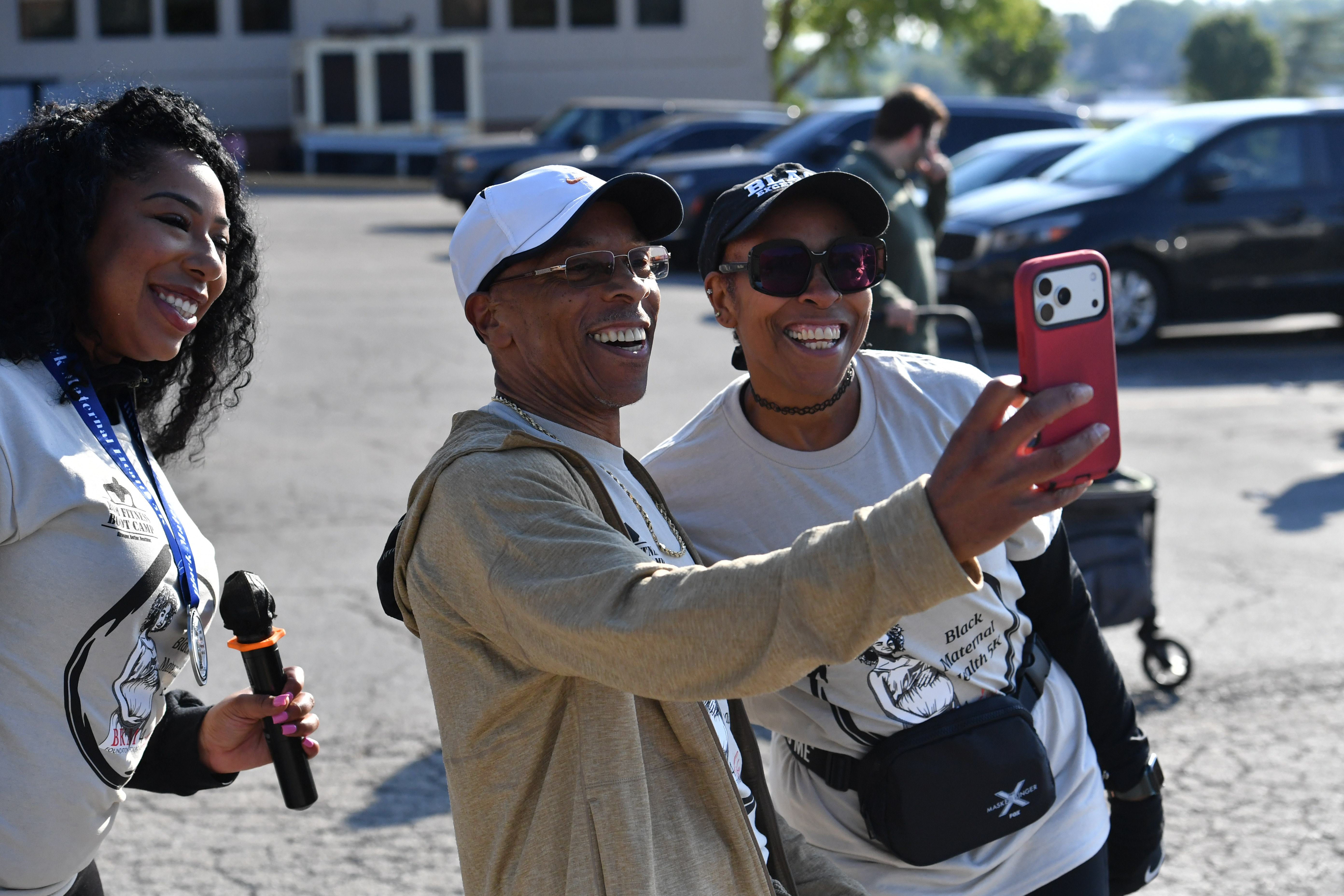 Three smiling participants taking a selfie at the 2026 BKM 4 Life Black Maternal Health 5K